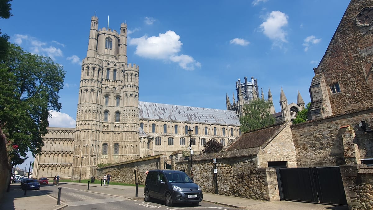 The West Tower and the long nave from the street, the Octagon beyond