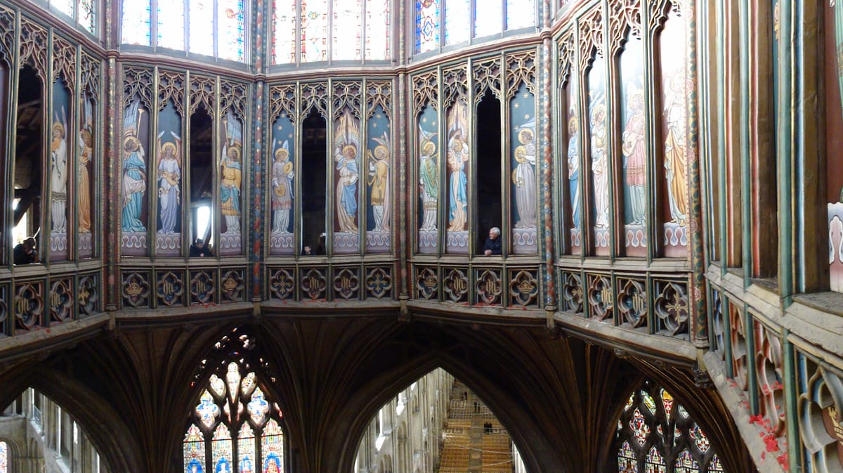Screens open in the lantern, with the nave far below