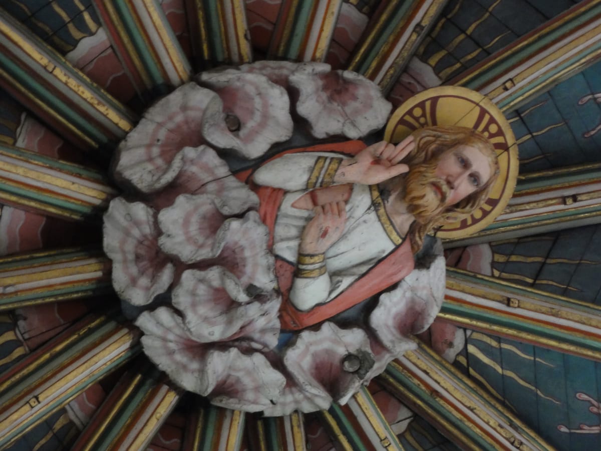 Christ, carved and painted on the boss at the centre of the lantern vault