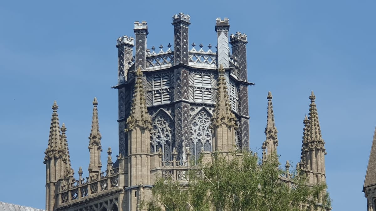 The lantern from the ground: lead and timber sitting on stone