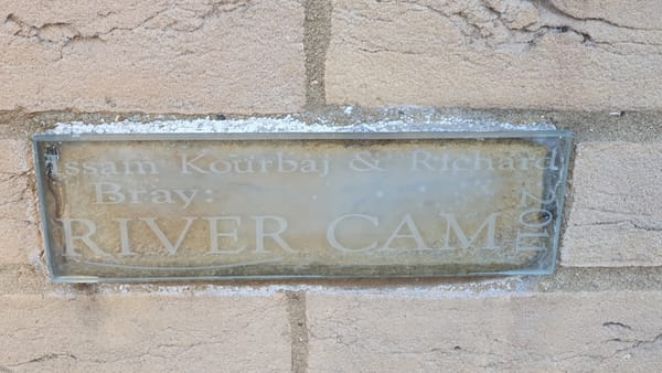Glass artwork representing river Cam and bridges. Glass artwork representing river Cam and bridges.