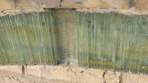 Glass artwork representing river Cam and bridges. Glass artwork representing river Cam and bridges.