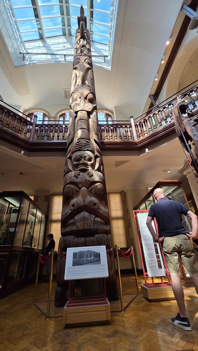The Haida totem pole from Tanu, from the floor of the hall