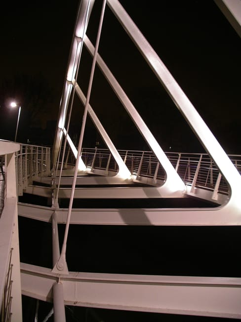 Riverside bridge at night